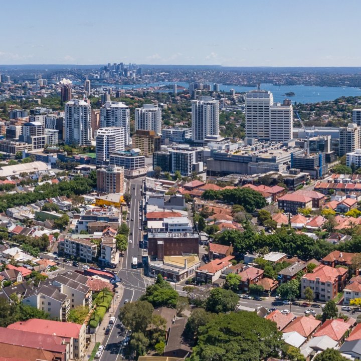 Aerial view of Eastern Suburbs across to North Sydney. Harbour Bridge is in the distance