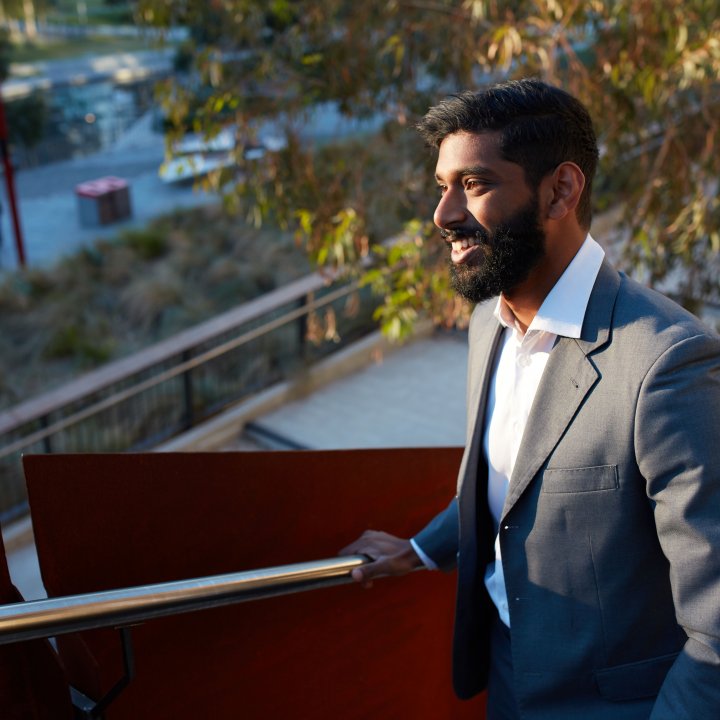 Man in suit on staircase